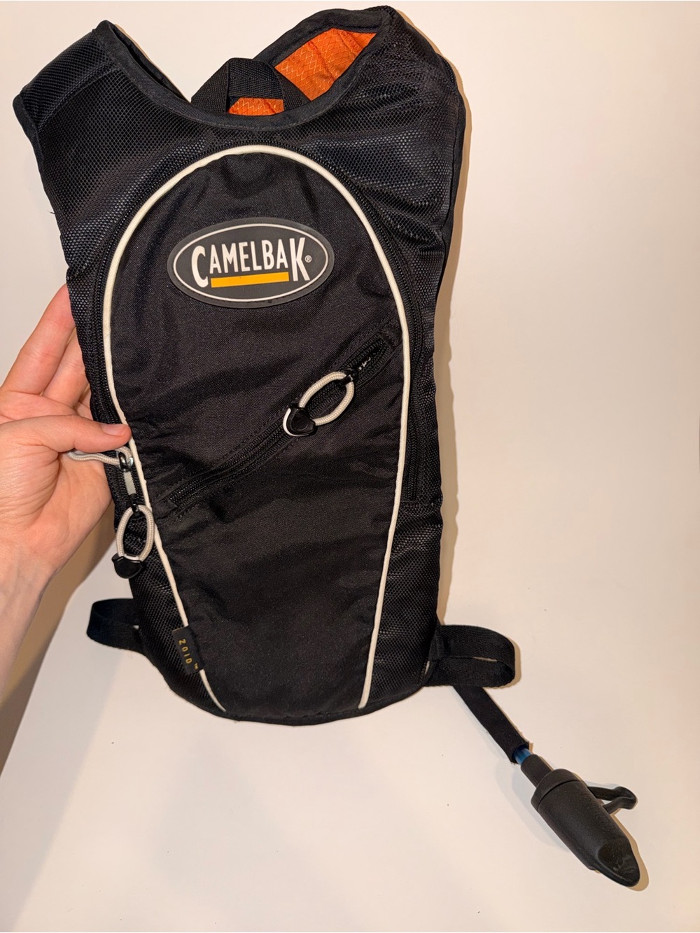CamelBak Black Hydration Backpack with Orange Lining